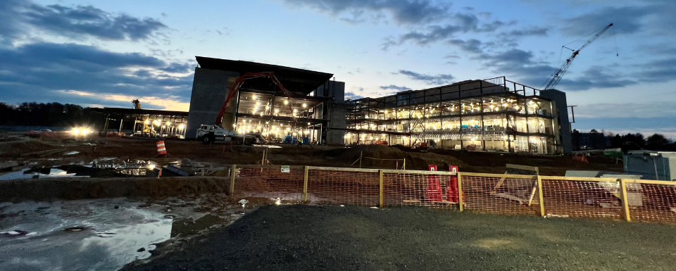 Central laboratory under construction at sunrise